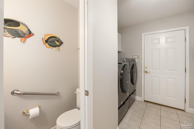 9638 Wills Ln, Lillian, AL 36549 - bathroom with independent washer and dryer, toilet, tile patterned floors, and baseboards