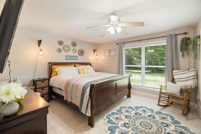 9638 Wills Ln, Lillian, AL 36549 - bedroom featuring light tile patterned floors, baseboards, and ceiling fan
