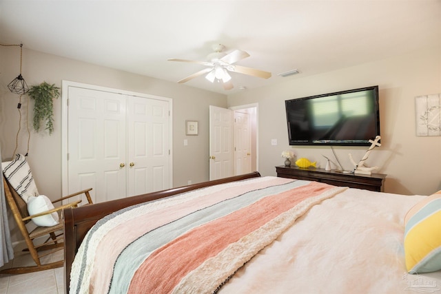 9638 Wills Ln, Lillian, AL 36549 - bedroom with a closet, ceiling fan, and tile patterned flooring