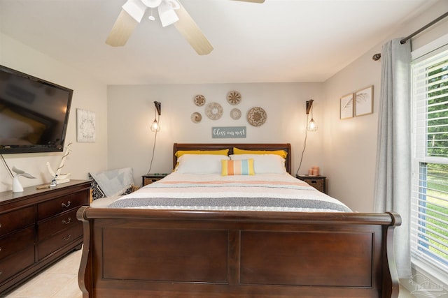9638 Wills Ln, Lillian, AL 36549 - bedroom with a ceiling fan and light tile patterned floors