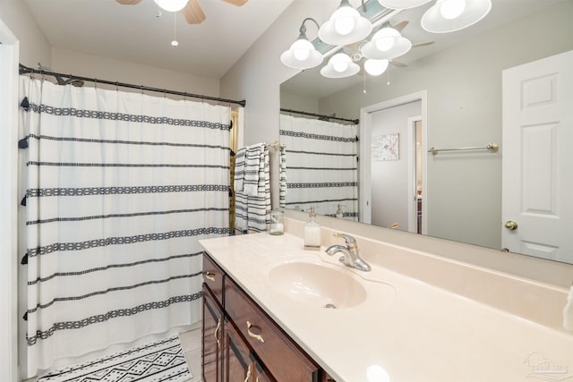 9638 Wills Ln, Lillian, AL 36549 - full bath featuring a ceiling fan, vanity, tile patterned floors, a chandelier, and a shower with curtain