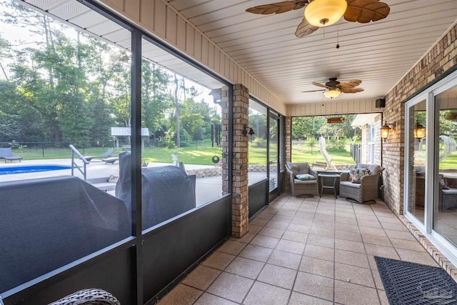 9638 Wills Ln, Lillian, AL 36549 - sunroom / solarium featuring a ceiling fan