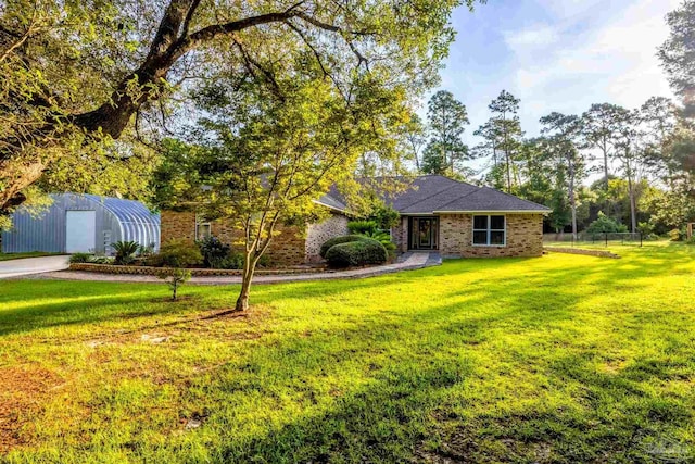 9638 Wills Ln, Lillian, AL 36549 - view of front of property with brick siding and an outbuilding