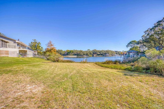 view of yard with a water view