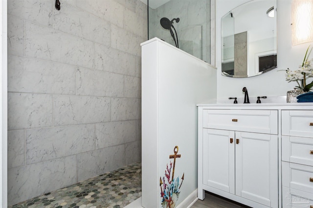 bathroom with vanity and walk in shower