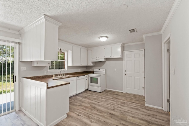 2500 Inda Ave, Pensacola, FL 32526 - kitchen featuring dark countertops, visible vents, light wood-style flooring, a sink, and white appliances