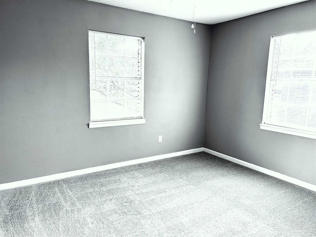 2500 Inda Ave, Pensacola, FL 32526 - carpeted spare room featuring a wealth of natural light and baseboards