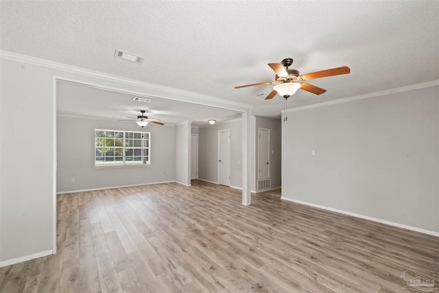 2500 Inda Ave, Pensacola, FL 32526 - unfurnished room featuring ornamental molding, baseboards, visible vents, and light wood finished floors