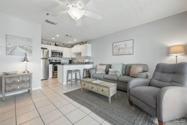 3191 Scenic Highway 98 Unit 212, Destin, FL 32541 - living room with light tile patterned floors, ceiling fan, and recessed lighting