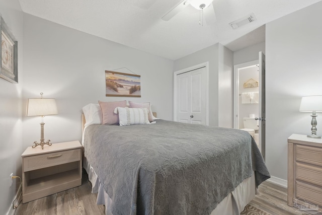 3191 Scenic Highway 98 Unit 212, Destin, FL 32541 - bedroom with wood finished floors, a closet, and a ceiling fan