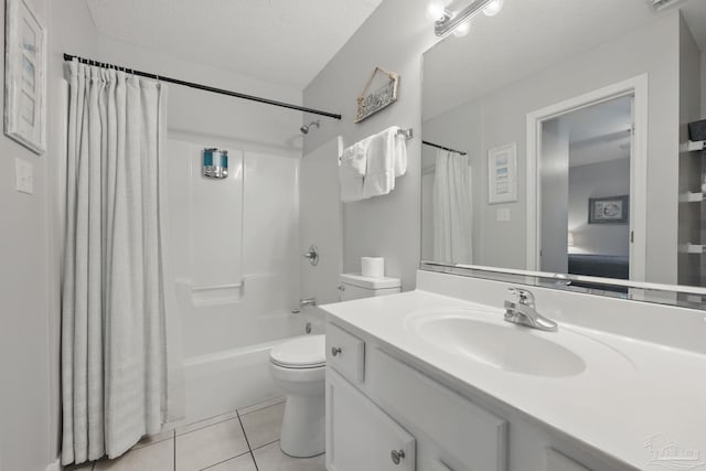3191 Scenic Highway 98 Unit 212, Destin, FL 32541 - bathroom with vanity, tile patterned flooring, a textured ceiling, and shower / tub combo