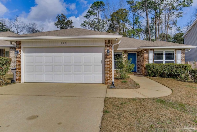 single story home featuring a garage