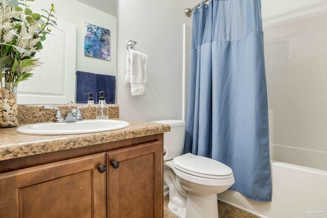 full bathroom featuring tile patterned flooring, vanity, shower / bathtub combination with curtain, and toilet