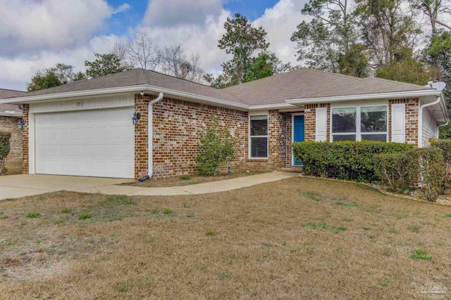 ranch-style house with a garage and a front lawn