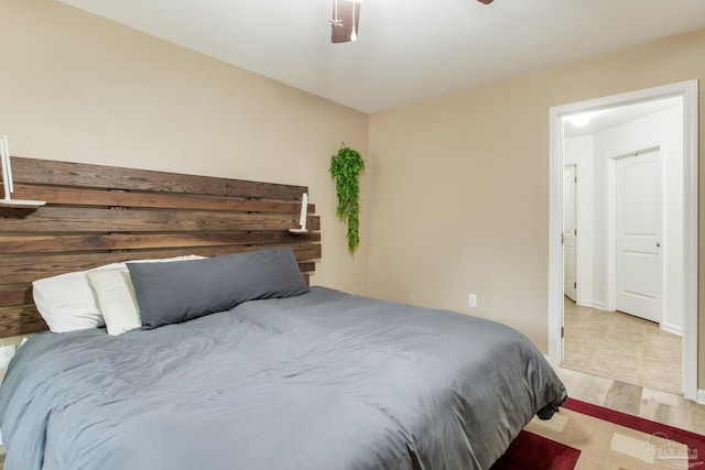 bedroom featuring ceiling fan and light hardwood / wood-style flooring