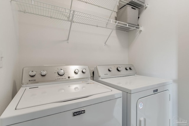 laundry area with washer and dryer