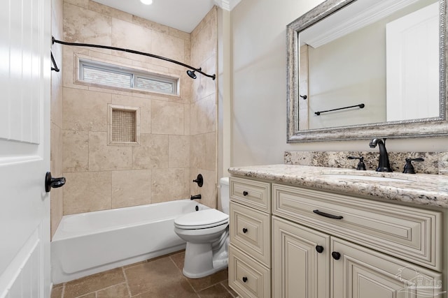 full bathroom with tiled shower / bath combo, vanity, and toilet