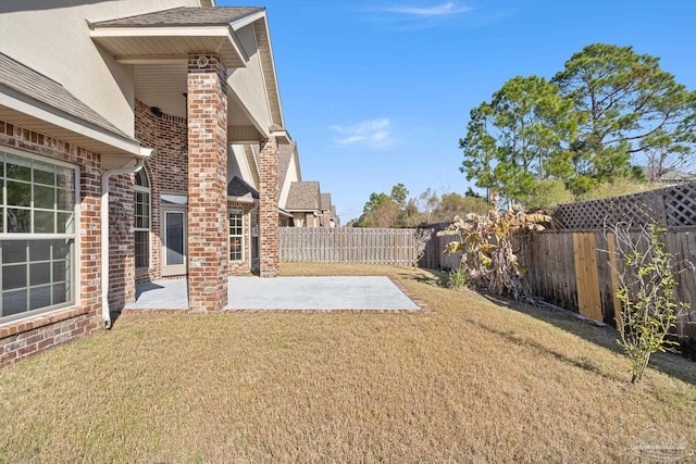 view of yard with a patio area