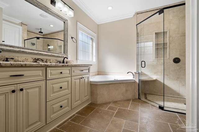 bathroom featuring crown molding, separate shower and tub, and vanity