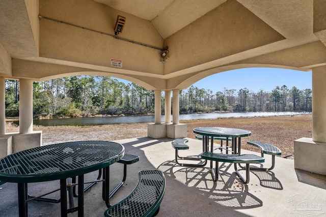 view of patio / terrace with a water view