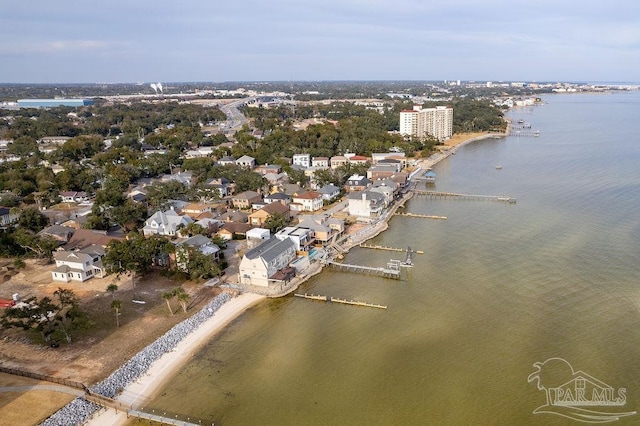 aerial view with a water view and a view of the beach