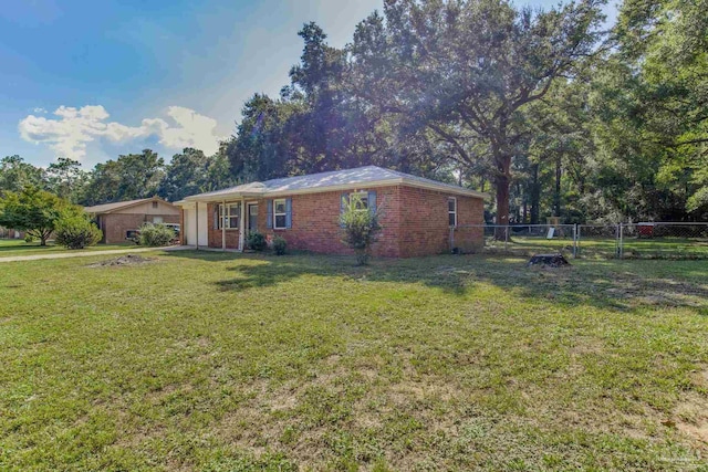 view of front of property with a front lawn