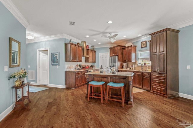 5757 Cobble Creek Dr, Pace, FL 32571 - kitchen with ornamental molding, stainless steel fridge with ice dispenser, ceiling fan, light countertops, and a sink