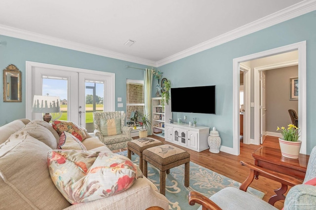 5757 Cobble Creek Dr, Pace, FL 32571 - living area featuring french doors, crown molding, baseboards, and wood finished floors