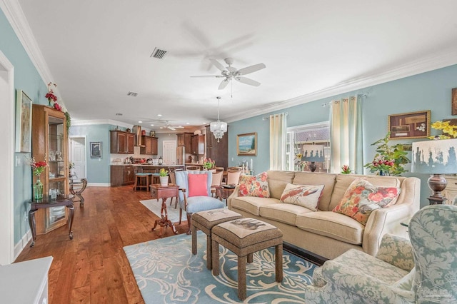 5757 Cobble Creek Dr, Pace, FL 32571 - living room with a ceiling fan, crown molding, dark wood-style floors, recessed lighting, and baseboards