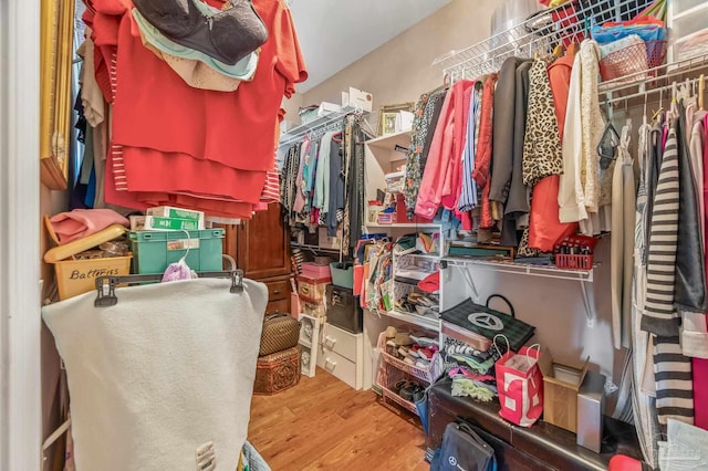 5757 Cobble Creek Dr, Pace, FL 32571 - walk in closet featuring wood finished floors