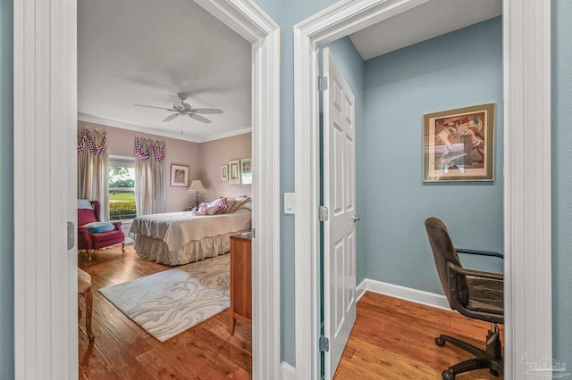 5757 Cobble Creek Dr, Pace, FL 32571 - bedroom featuring wood finished floors, ornamental molding, baseboards, and a ceiling fan