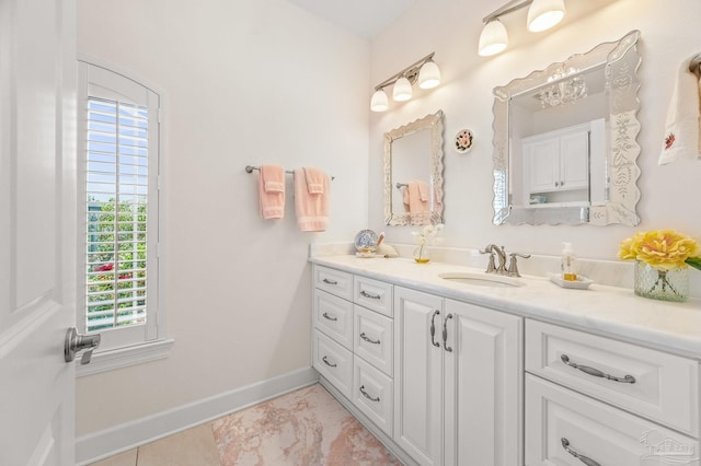 5757 Cobble Creek Dr, Pace, FL 32571 - bathroom with vanity and baseboards
