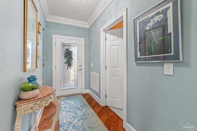 5757 Cobble Creek Dr, Pace, FL 32571 - entryway with ornamental molding, wood finished floors, and baseboards