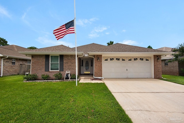 3774 Mcnemar Ct, Gulf Breeze, FL 32563 - ranch-style home with a garage, concrete driveway, a front lawn, and brick siding