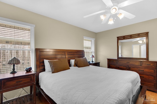 3774 Mcnemar Ct, Gulf Breeze, FL 32563 - bedroom with a ceiling fan and wood finished floors