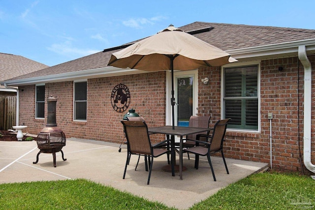 3774 Mcnemar Ct, Gulf Breeze, FL 32563 - view of patio featuring an outdoor fire pit and outdoor dining space