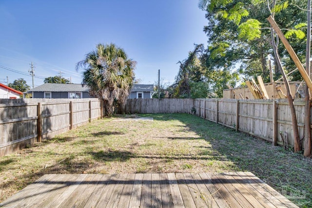 view of yard with a deck