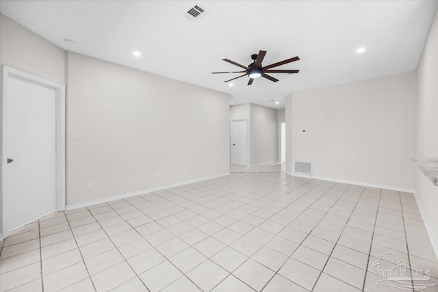 empty room with baseboards, recessed lighting, visible vents, and a ceiling fan