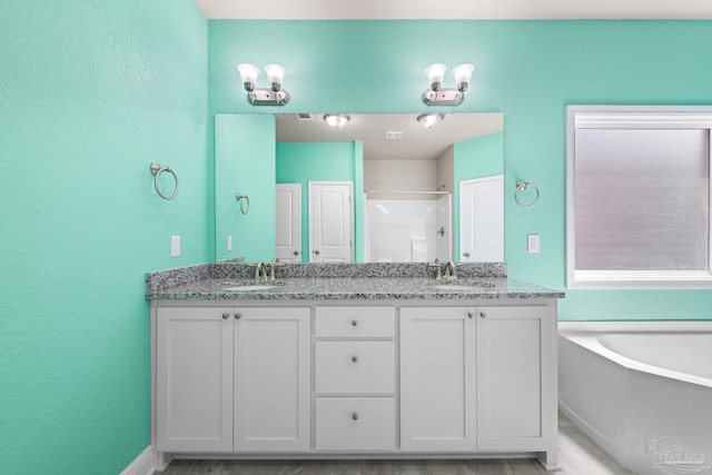3826 Ranch Rd, Pace, FL 32571 - full bath with a textured wall, a stall shower, and a sink
