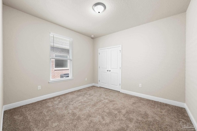 3826 Ranch Rd, Pace, FL 32571 - carpeted spare room with baseboards