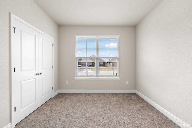 3826 Ranch Rd, Pace, FL 32571 - unfurnished bedroom with carpet floors and baseboards