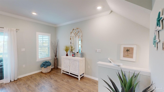 interior space featuring ornamental molding and hardwood / wood-style floors