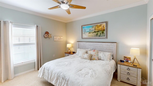 carpeted bedroom with crown molding and ceiling fan