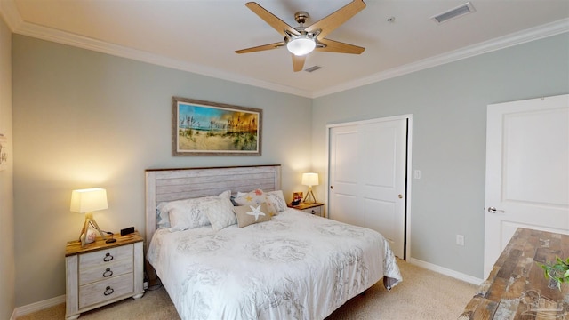 carpeted bedroom with crown molding and ceiling fan