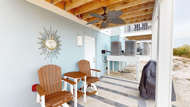 view of patio / terrace featuring ceiling fan