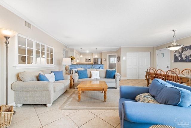 1111 Ft Pickens Rd Unit 111, Pensacola Beach, FL 32561 - living room with light tile patterned floors and crown molding