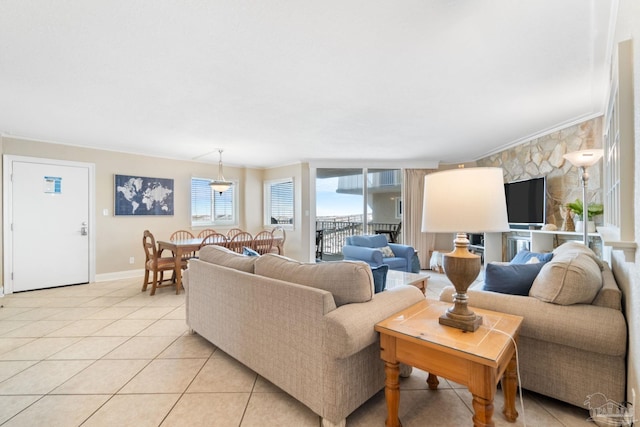 1111 Ft Pickens Rd Unit 111, Pensacola Beach, FL 32561 - living area with light tile patterned floors and ornamental molding