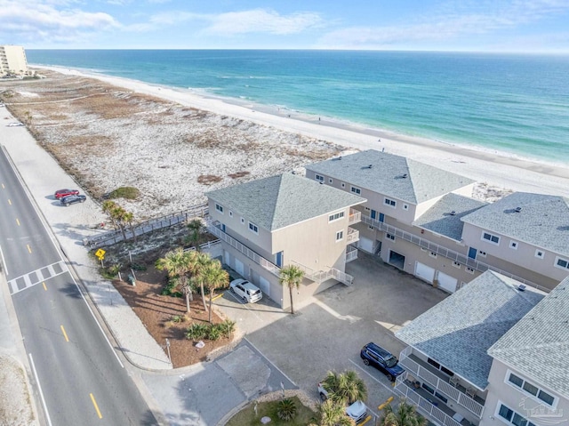 aerial view featuring a water view and a view of the beach