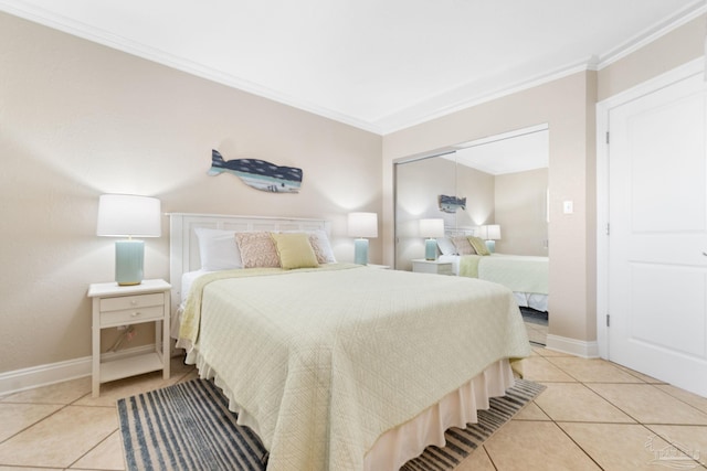1111 Ft Pickens Rd Unit 111, Pensacola Beach, FL 32561 - bedroom featuring light tile patterned flooring, ornamental molding, and a closet