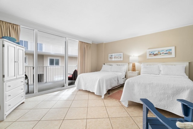 1111 Ft Pickens Rd Unit 111, Pensacola Beach, FL 32561 - bedroom with light tile patterned flooring, access to exterior, and crown molding